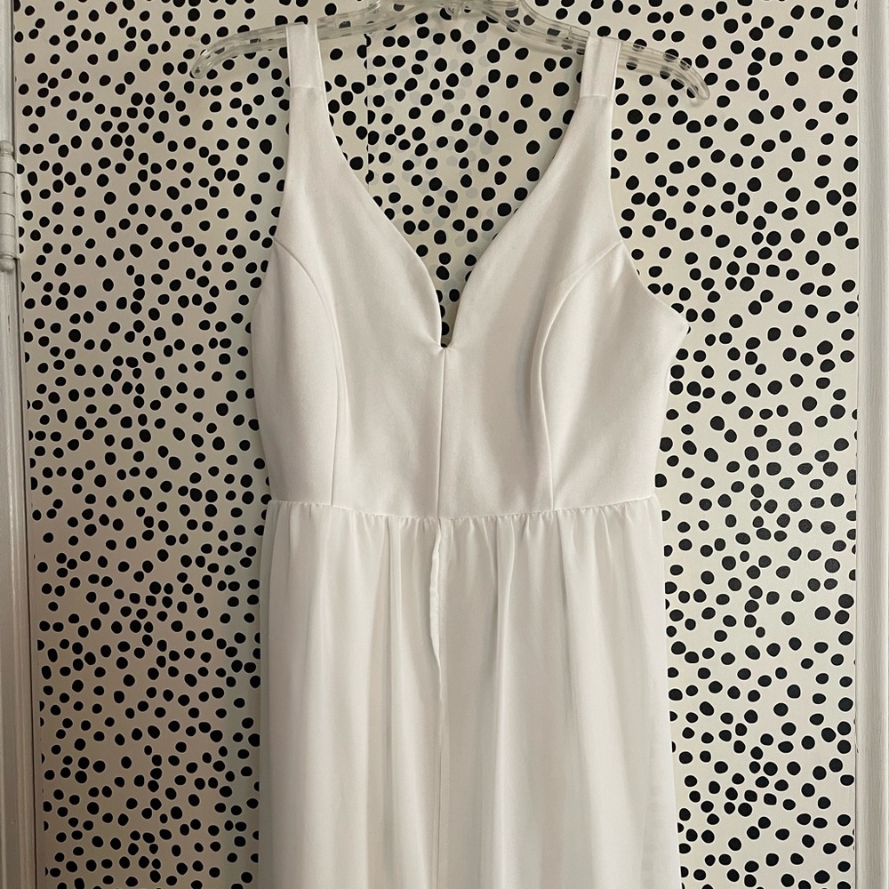 Bridal Sweetheart cut white dress with skirt overlay